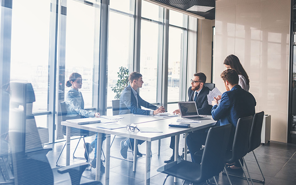 Image of a boardroom meeting - representing how Mier Human Capital can help businesses grow and attract new talent