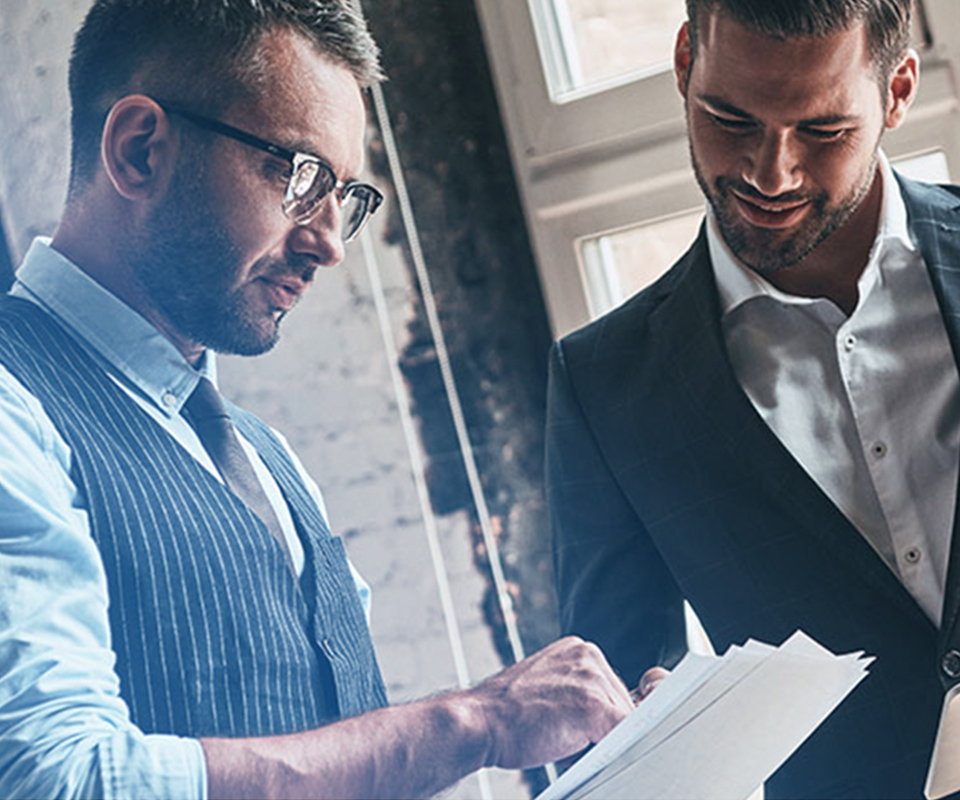 Image of two people working in an office environment - representing how Mier Human Capital can help employers